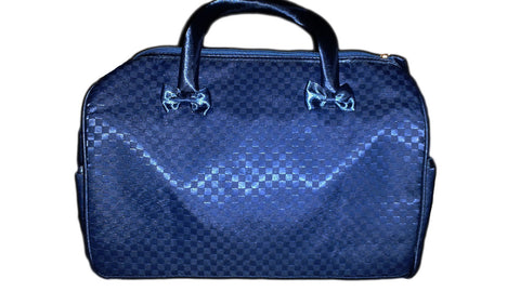 Suitcase type bag.    Bolsa tipo maleta