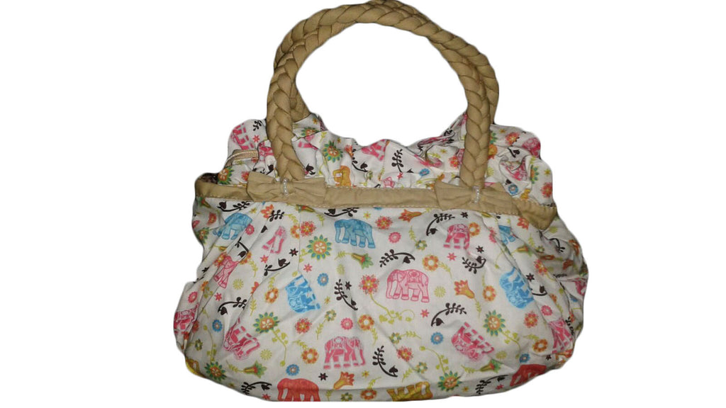 Cute embroidered handbag.   Linda bolsa de mano bordada.